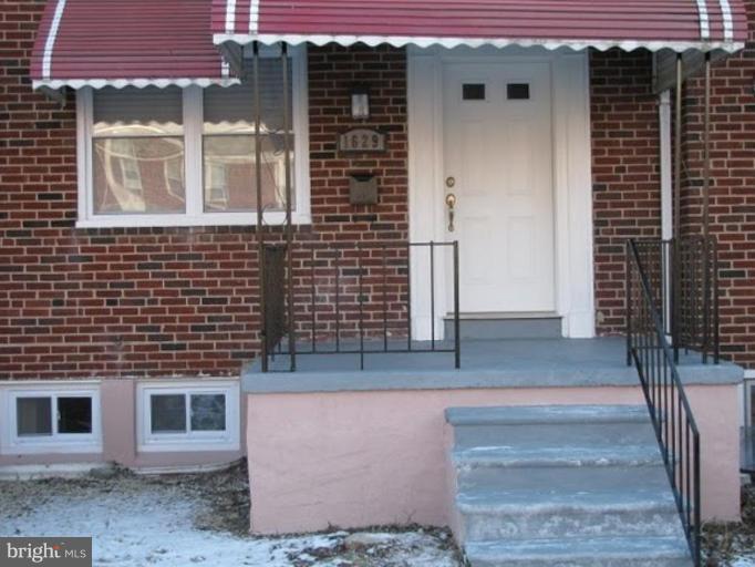 1629 Northgate Road Baltimore, MD 21218 - Photo 1 of 29 a front view of a house