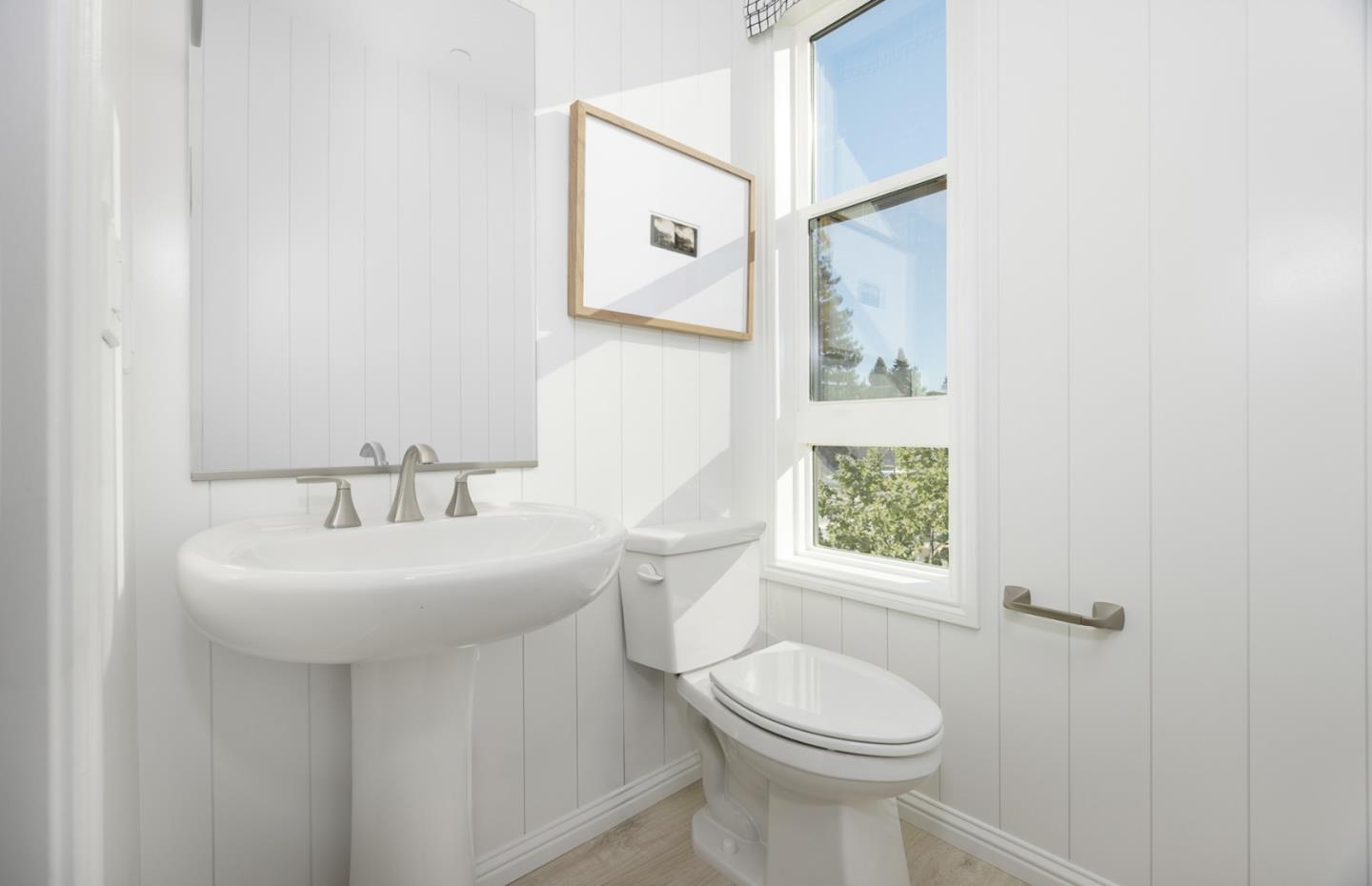 1145 Milan Terrace, Unit 9 Sunnyvale, CA 94089 - Photo 13 of 20 a bathroom with a toilet sink and mirror