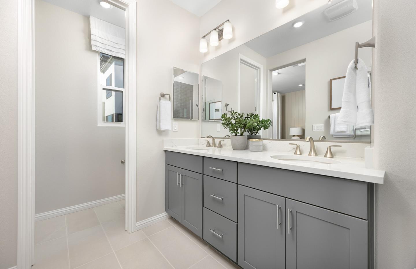 1145 Milan Terrace, Unit 9 Sunnyvale, CA 94089 - Photo 15 of 20 a bathroom with a sink and a mirror