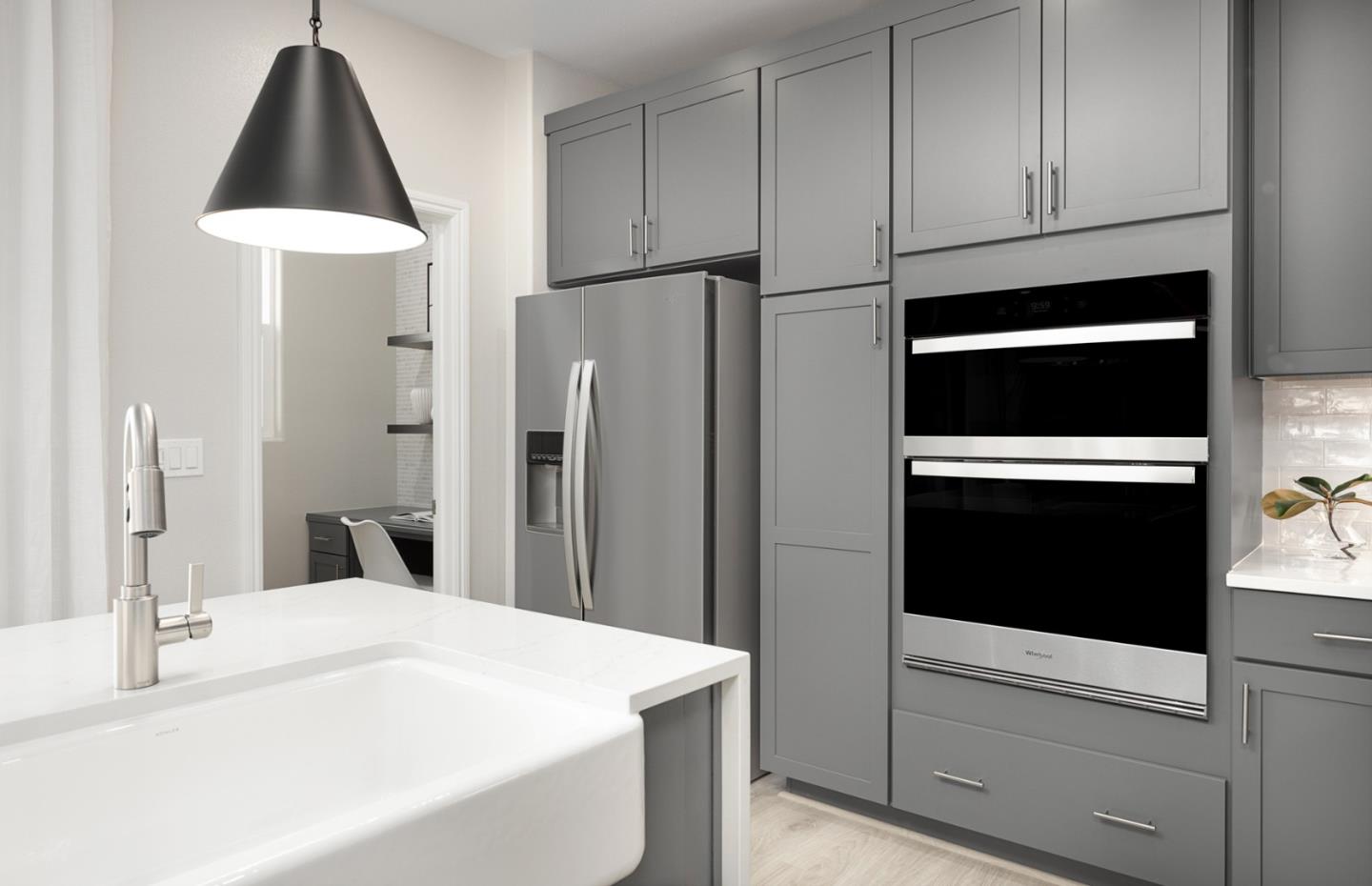 1145 Milan Terrace, Unit 9 Sunnyvale, CA 94089 - Photo 17 of 20 a kitchen with stainless steel appliances kitchen island a refrigerator sink and cabinets