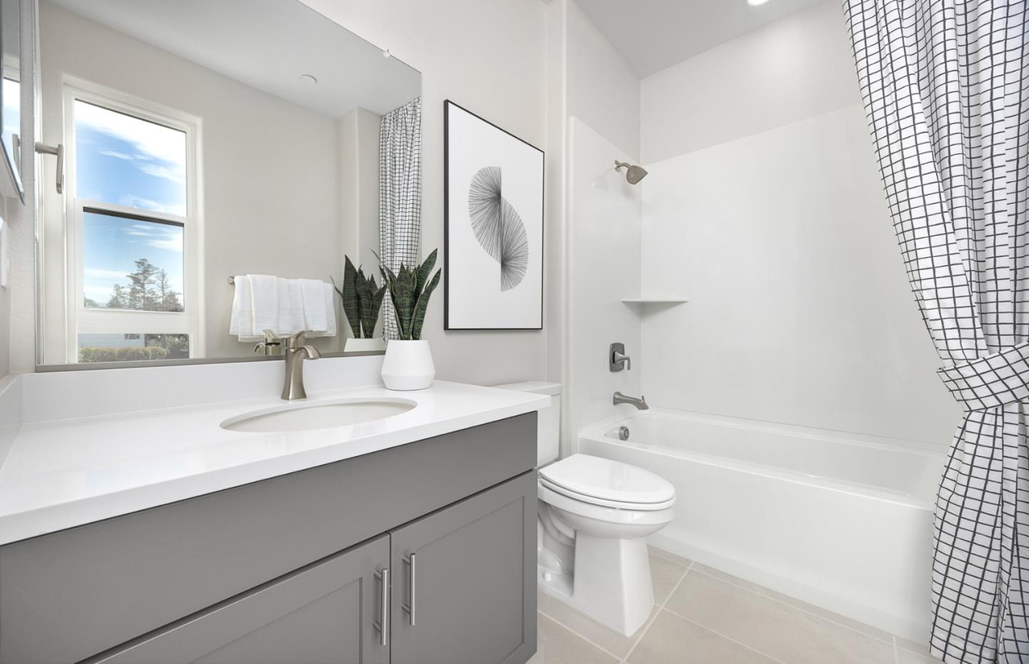 1145 Milan Terrace, Unit 9 Sunnyvale, CA 94089 - Photo 5 of 20 a bathroom with a sink a toilet and shower