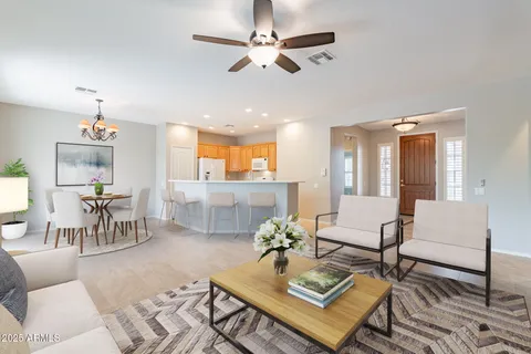 a living room with furniture and a table