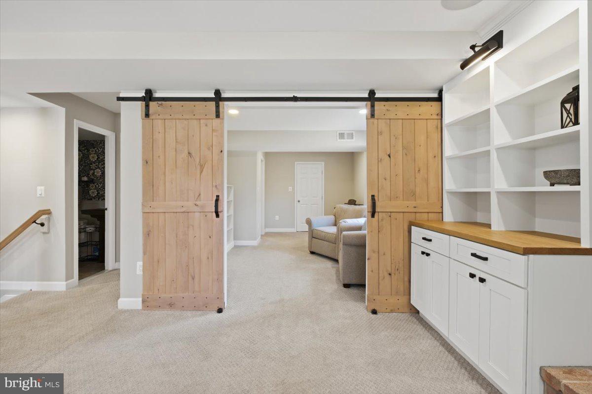 7300 Reservation Drive Springfield, VA 22153 - Photo 13 of 44 Office/Sitting area with barn doors