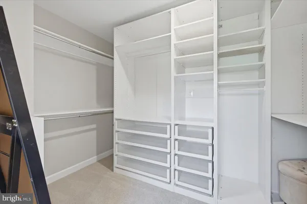 a bathroom with a double vanity sink and mirror
