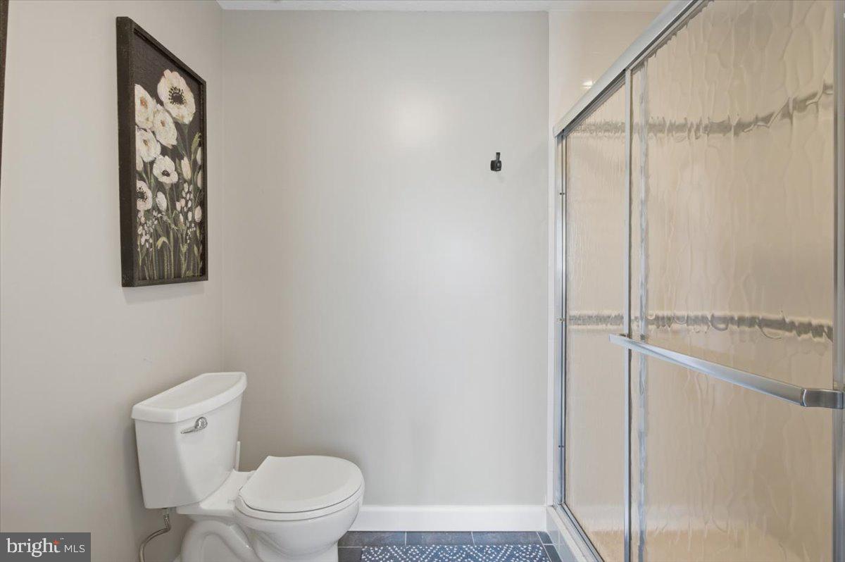 7300 Reservation Drive Springfield, VA 22153 - Photo 29 of 44 Primary en-suite toilet, bidet and stand up shower