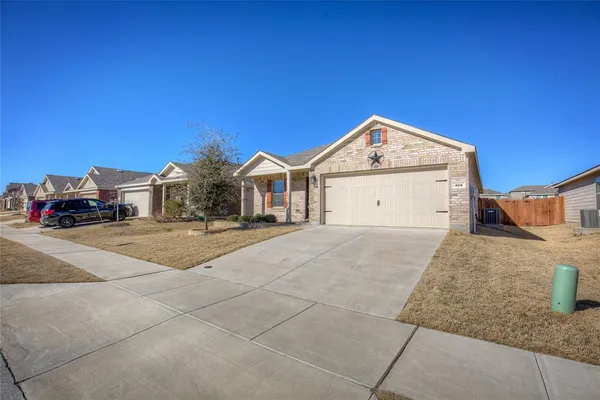 a car parked in front of a house