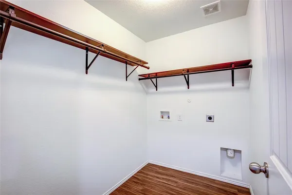 a view of small space with racks on the wall