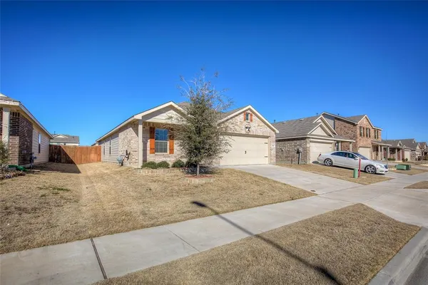 a view of house with yard