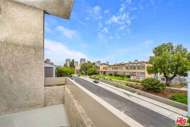 a city street lined with tall buildings