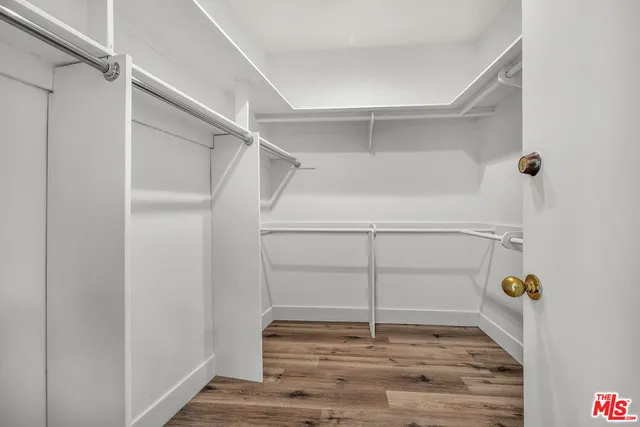 a view of an empty walk in closet