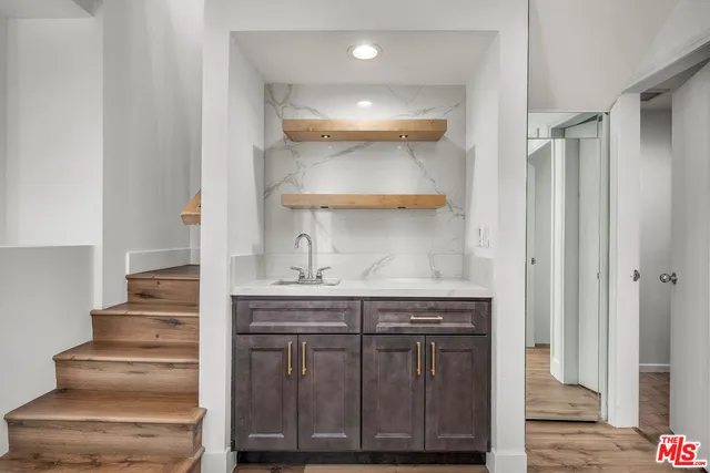 a view of entryway with wooden floor