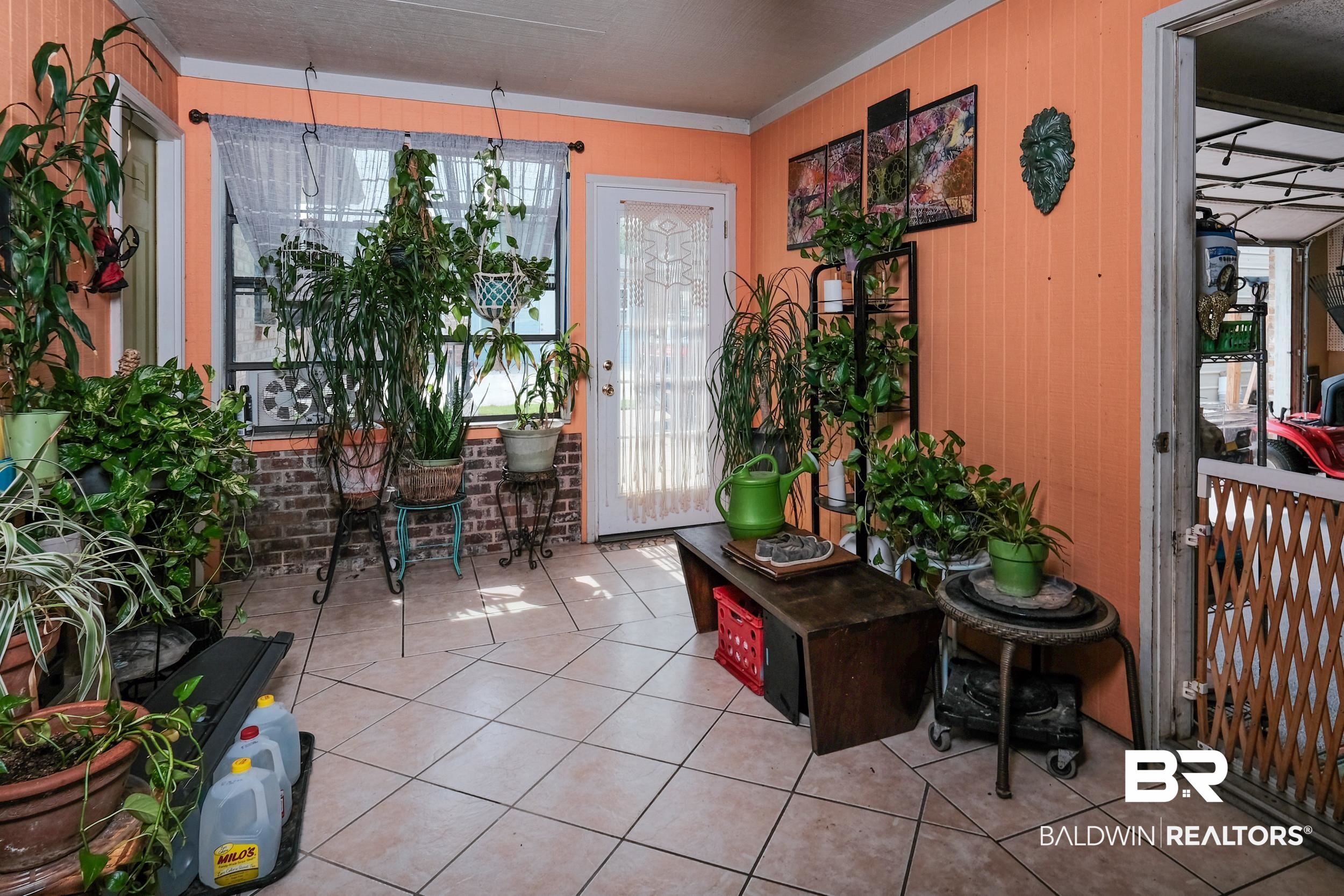 504 Ariel Avenue Foley, AL 36535 - Photo 25 of 33 View of sunroom