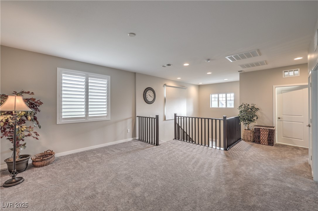 2711 Evolutionary Lane Las Vegas, NV 89138 - Photo 19 of 37 Carpeted spare room featuring recessed lighting and baseboards