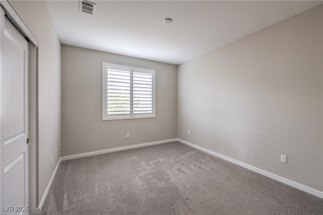 2711 Evolutionary Lane Las Vegas, NV 89138 - Photo 29 of 37 Spare room with carpet floors and baseboards