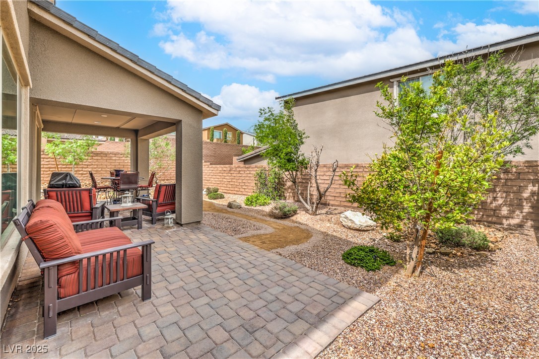 2711 Evolutionary Lane Las Vegas, NV 89138 - Photo 32 of 37 View of patio featuring outdoor dining area