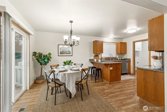 a view of a dining room with furniture