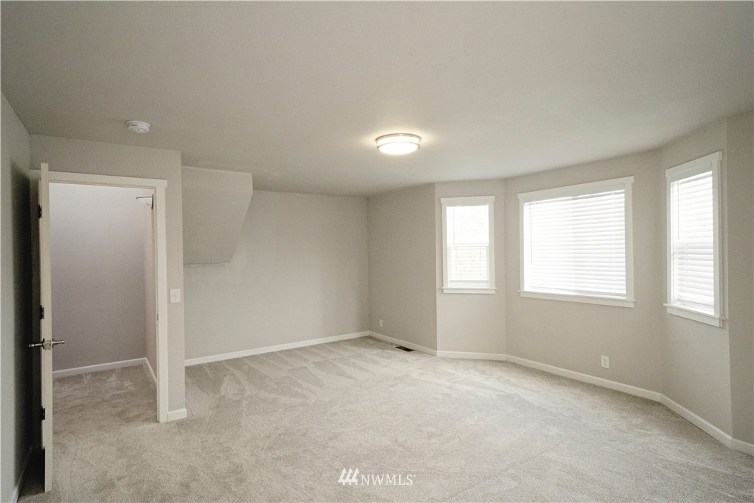 22316 6th Drive Southeast Bothell, WA 98021 - Photo 15 of 35 an empty room with windows