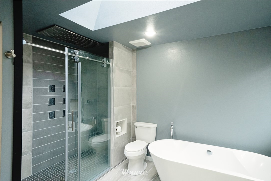 22316 6th Drive Southeast Bothell, WA 98021 - Photo 24 of 35 a bathroom with a toilet and a shower
