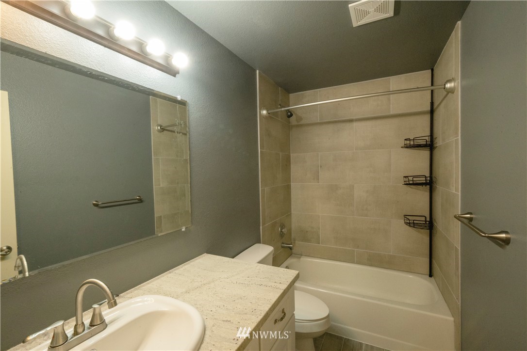 22316 6th Drive Southeast Bothell, WA 98021 - Photo 29 of 35 a bathroom with a sink and a mirror