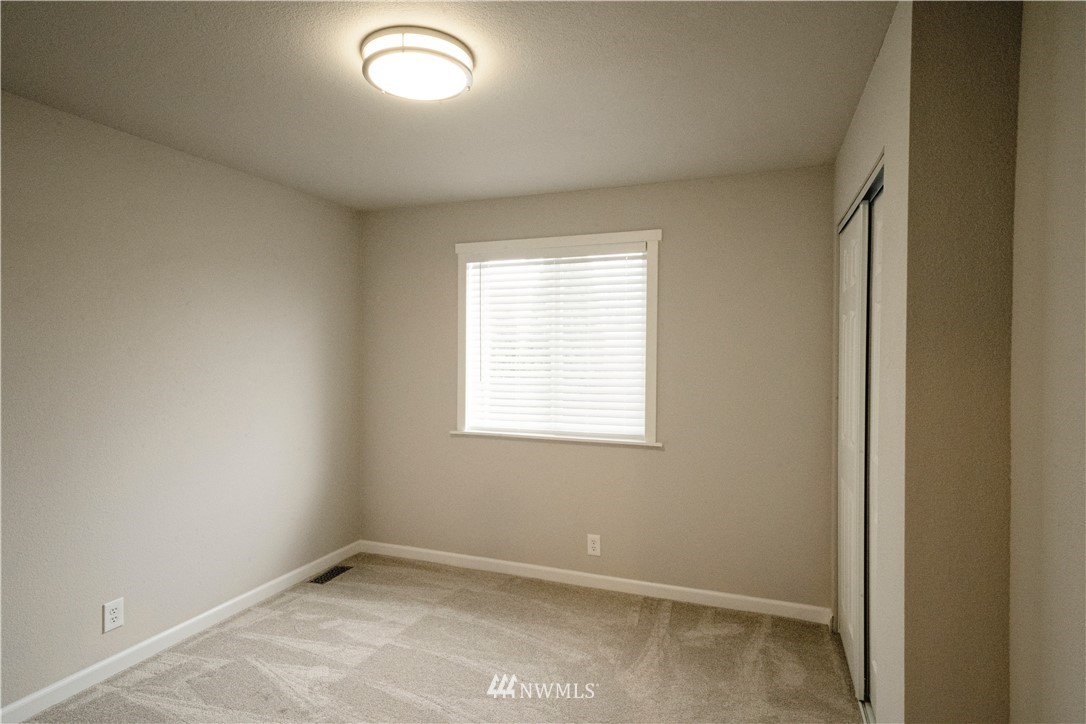 22316 6th Drive Southeast Bothell, WA 98021 - Photo 30 of 35 an empty room with a window