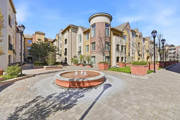 a building with trees in front of it