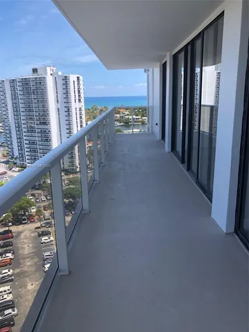 a view of a balcony with an outdoor space