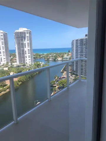 a view of a balcony with city view