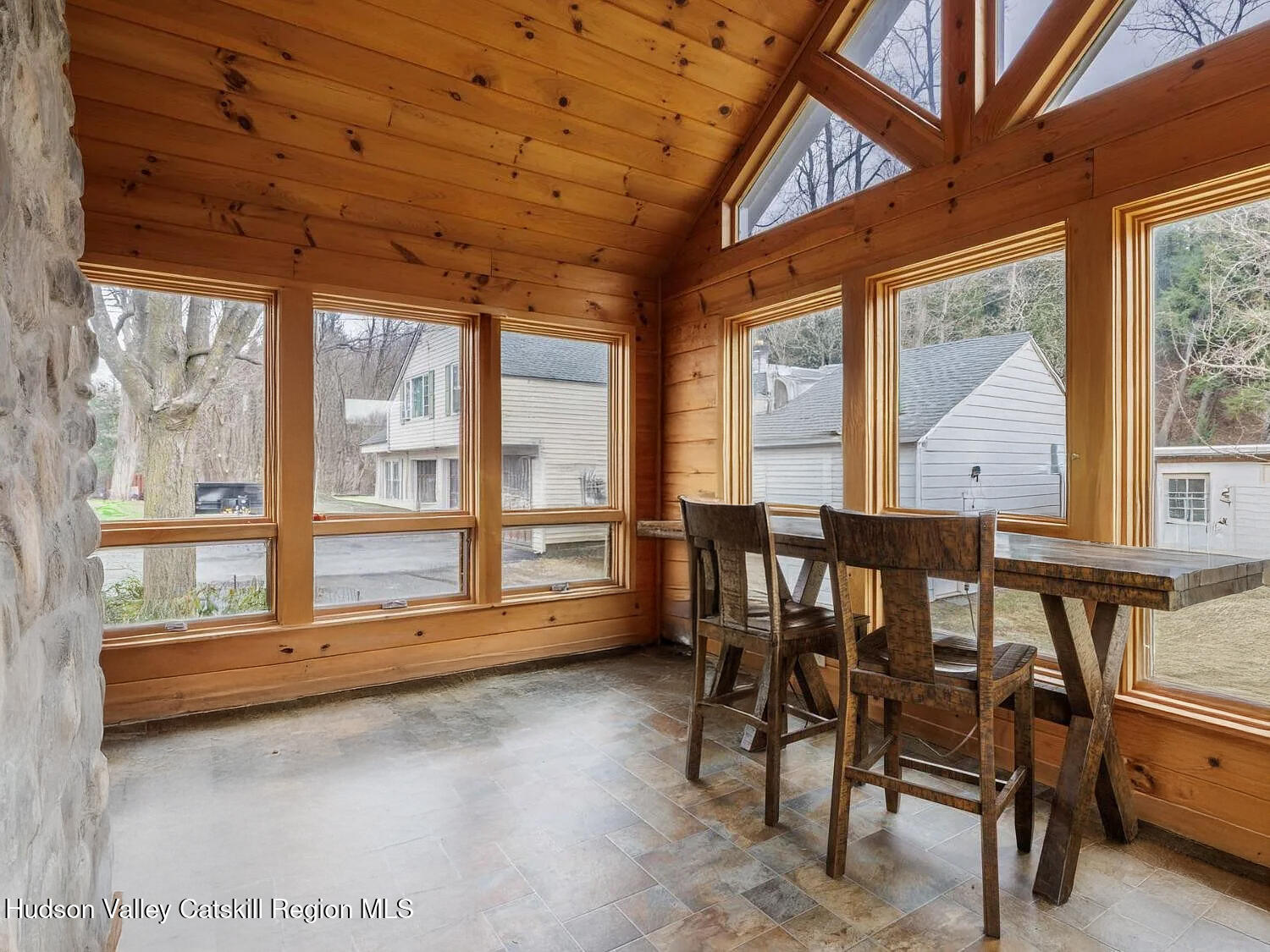 25 Vets Road Windham, NY 12496 - Photo 21 of 74 a view of a dining room with furniture window and outside view
