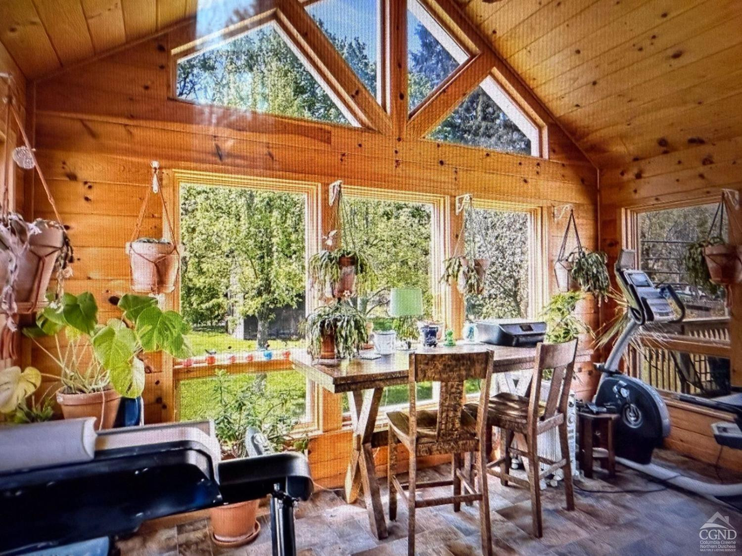 25 Vets Road Windham, NY 12496 - Photo 22 of 74 a view of a dining room with furniture window and outside view