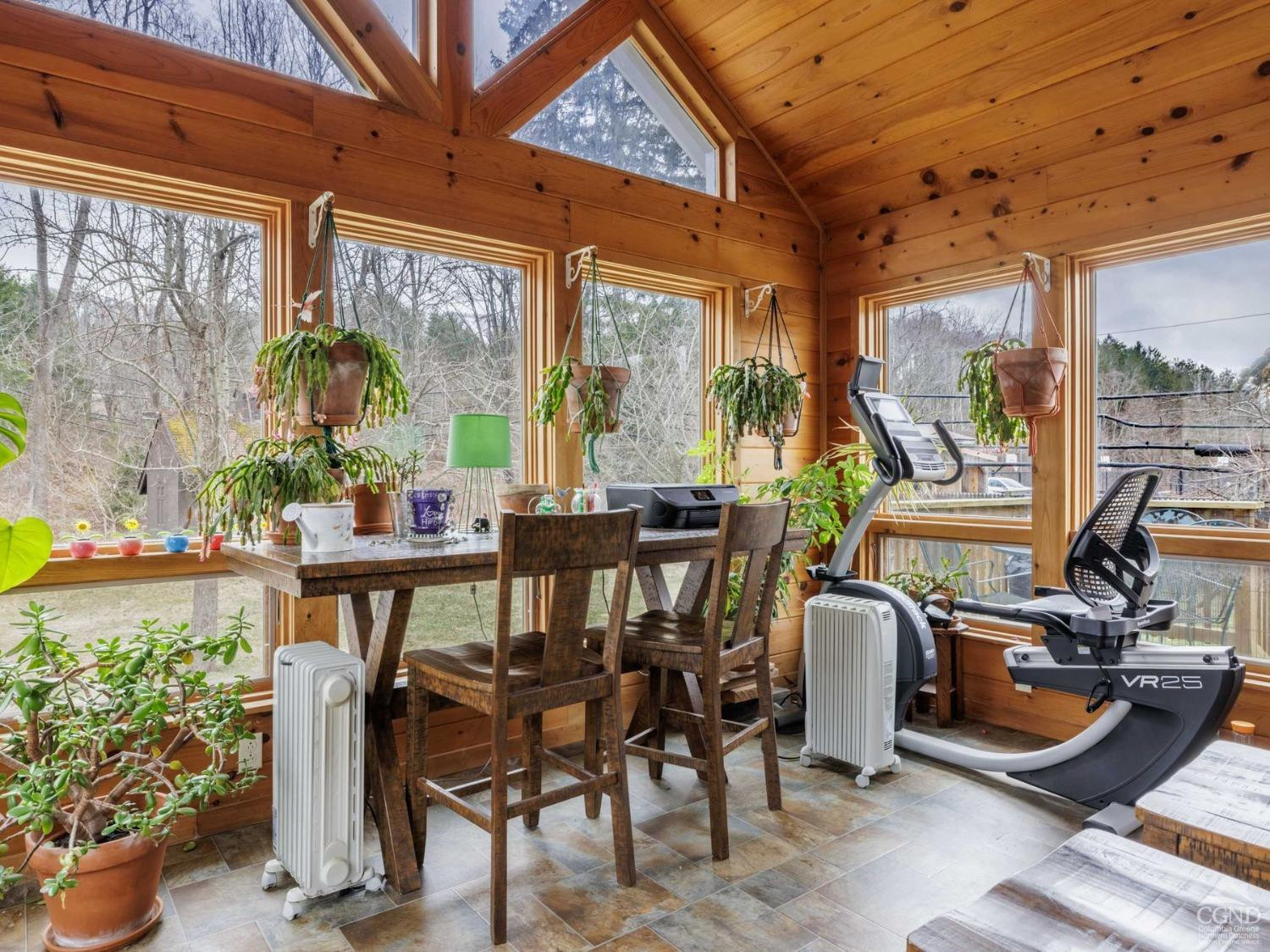 25 Vets Road Windham, NY 12496 - Photo 23 of 74 a view of a dining room with furniture window and outside view