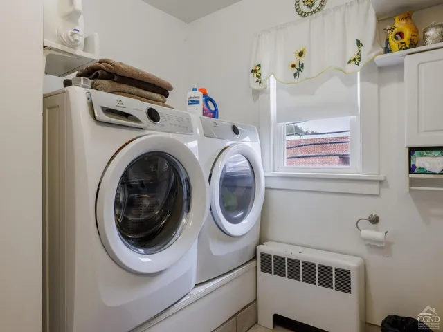 a kitchen with stainless steel appliances granite countertop a stove and a microwave