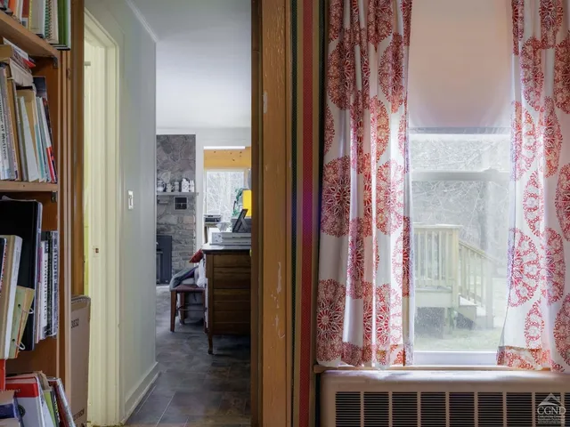 a bedroom with a bed and a cabinets