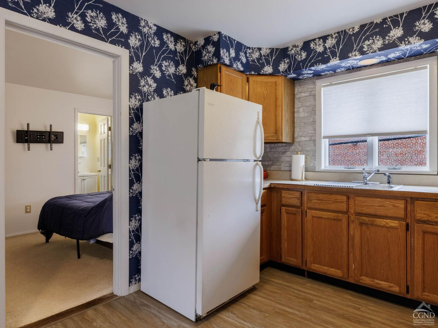 25 Vets Road Windham, NY 12496 - Photo 44 of 74 a white refrigerator freezer sitting inside of a kitchen