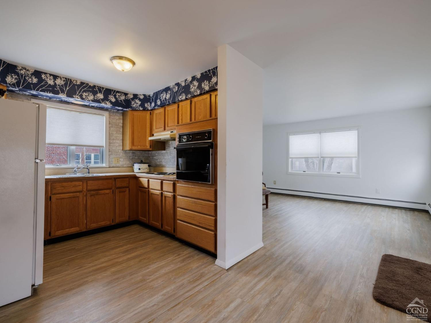 25 Vets Road Windham, NY 12496 - Photo 45 of 74 a kitchen with sink cabinets and wooden floor