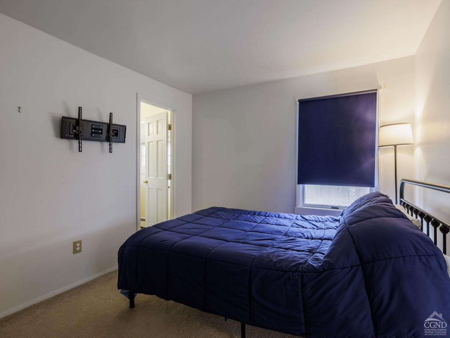 25 Vets Road Windham, NY 12496 - Photo 46 of 74 a bedroom with a bed and cabinets