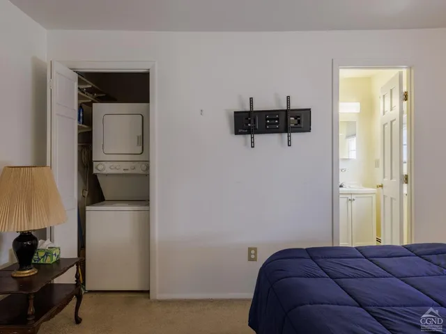 a front view of a house with a garden and a garden