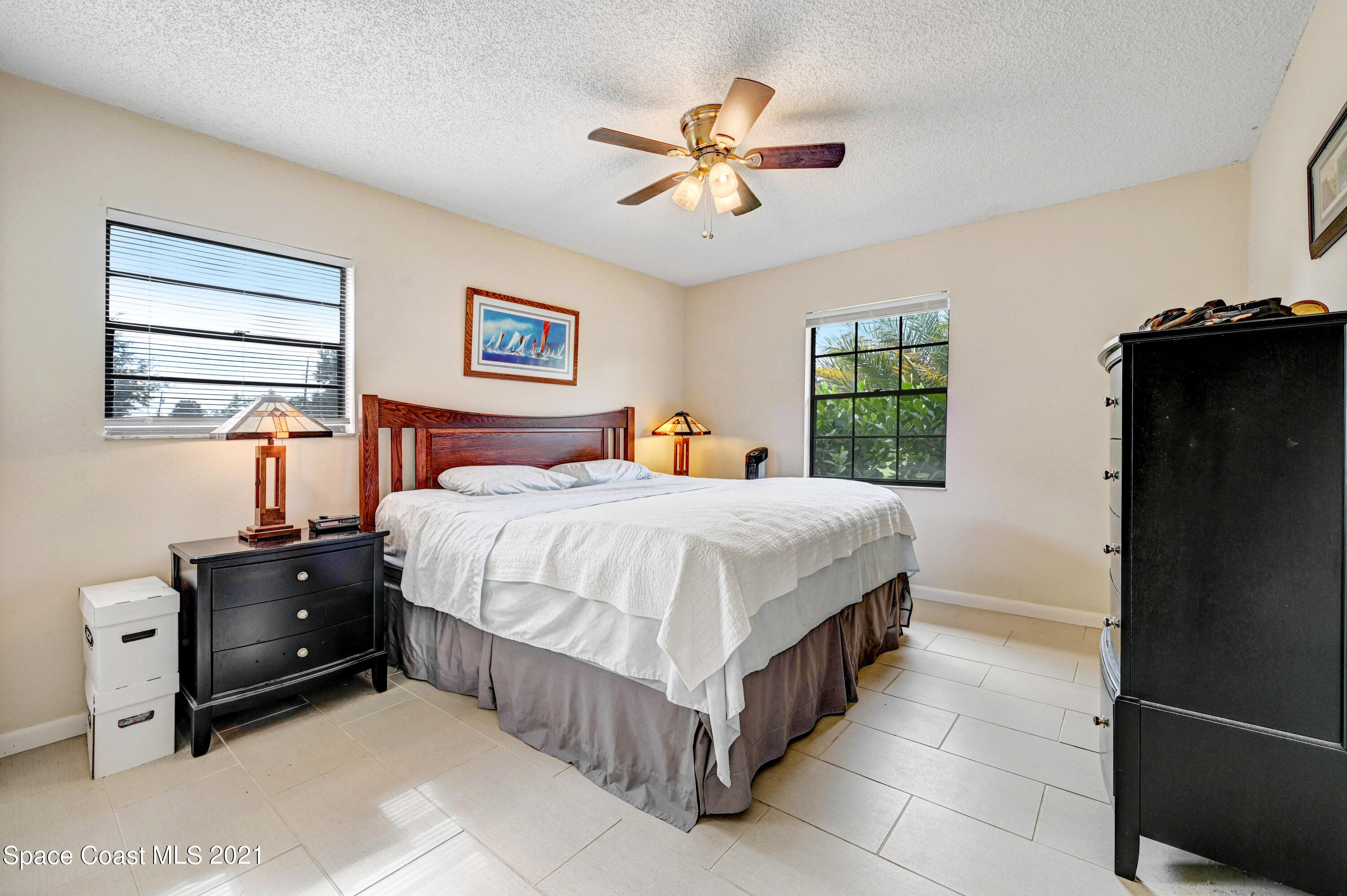 1537 Magnolia Street Northeast Palm Bay, FL 32905 - Photo 26 of 29 a bedroom with a bed and window