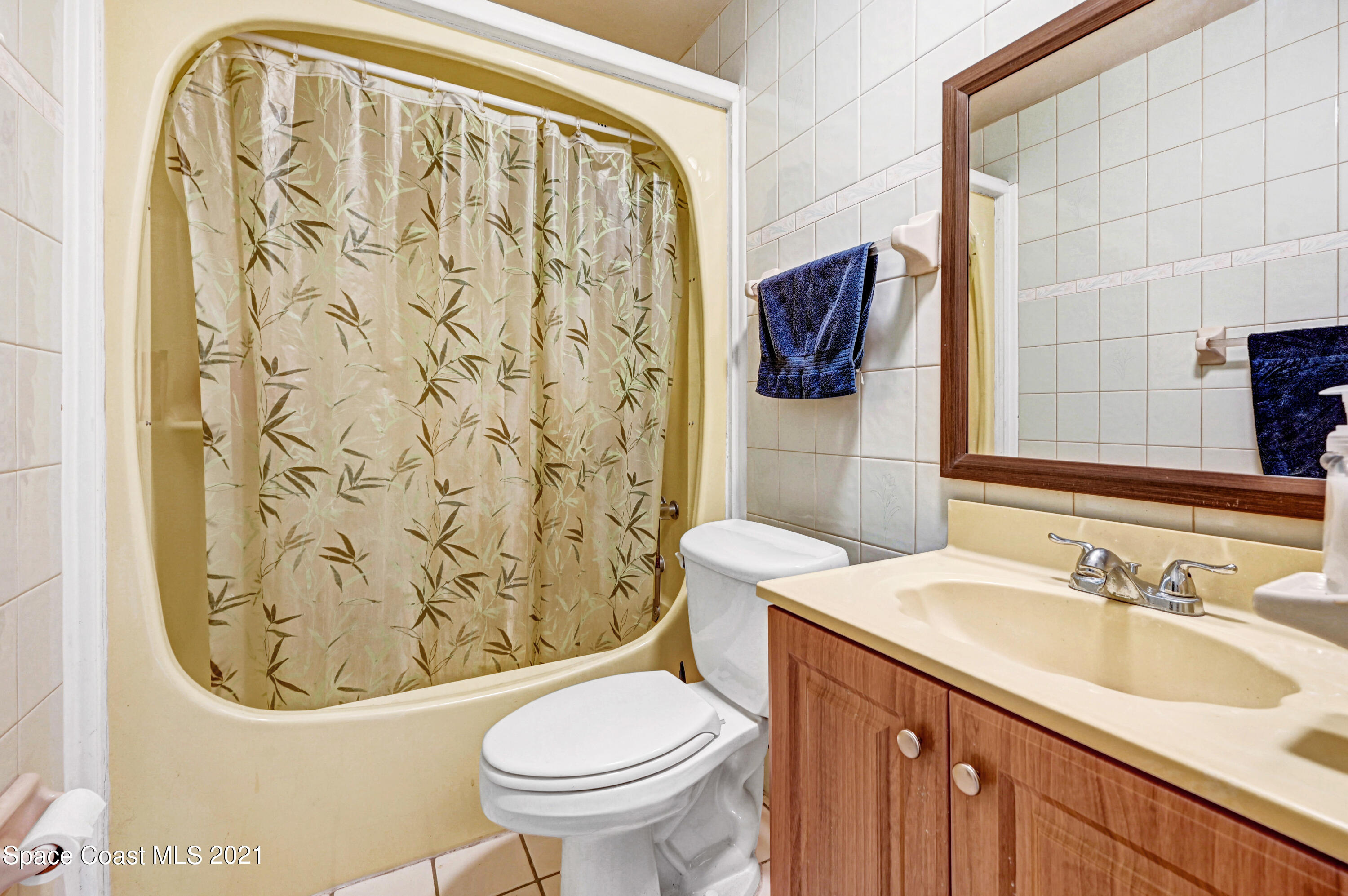 1537 Magnolia Street Northeast Palm Bay, FL 32905 - Photo 29 of 29 a bathroom with a sink and a toilet