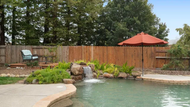 a garden view with a seating space