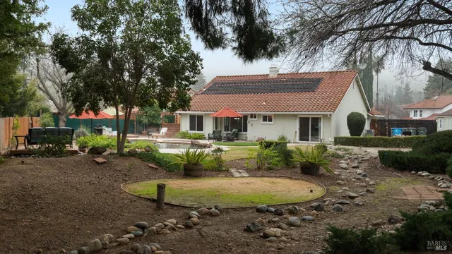 a view of backyard with green space