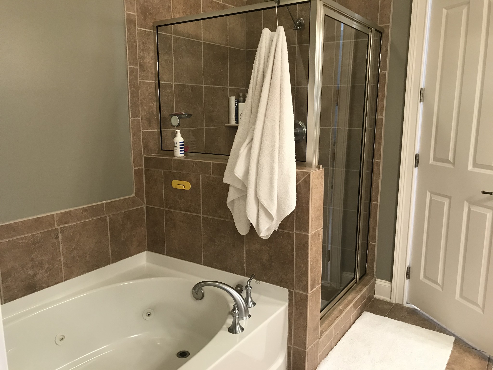 211 Acadia Avenue Franklin, TN 37064 - Photo 11 of 21 a bathroom with a bath tub and shower