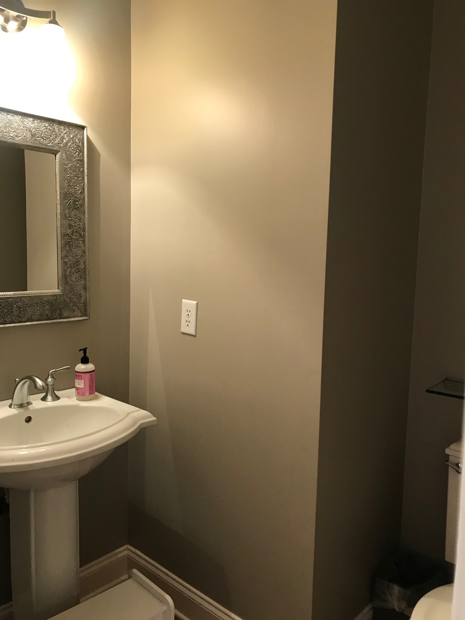 211 Acadia Avenue Franklin, TN 37064 - Photo 17 of 21 a bathroom with a sink and a mirror