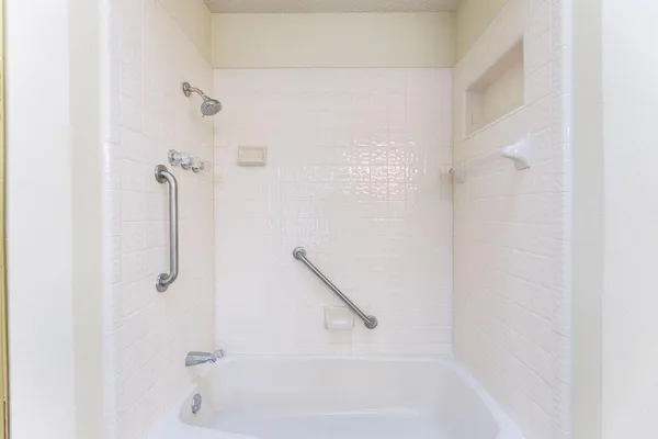 a bathroom with a bath tub
