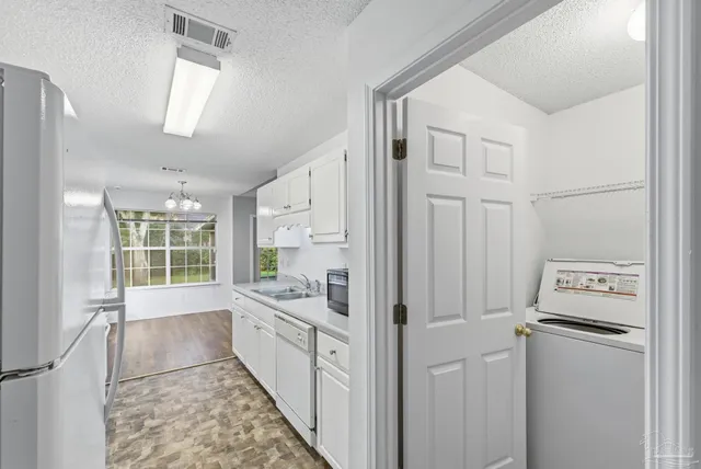 a bathroom with a bathtub and a sink