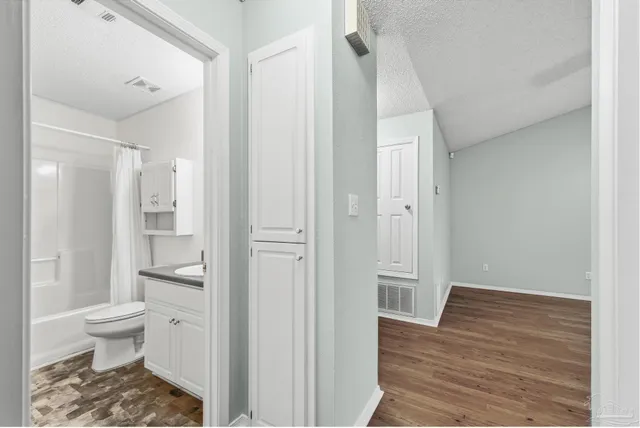 a bathroom with a sink and a toilet