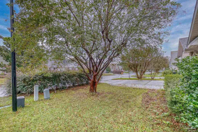 a view of backyard with outdoor space