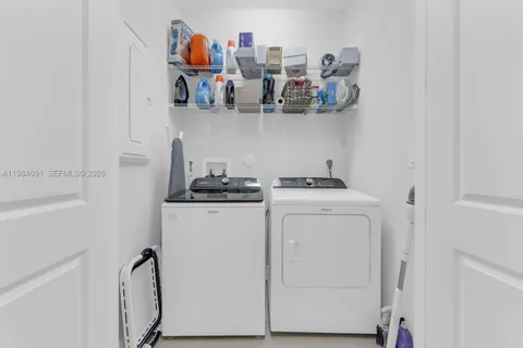 an aerial view of a house with garden and patio