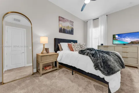 a room with furniture and white walls