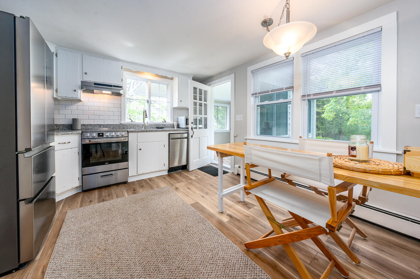 264 Route 28 Harwich, MA 02646 - Photo 20 of 39 a kitchen with a stove a sink and a refrigerator