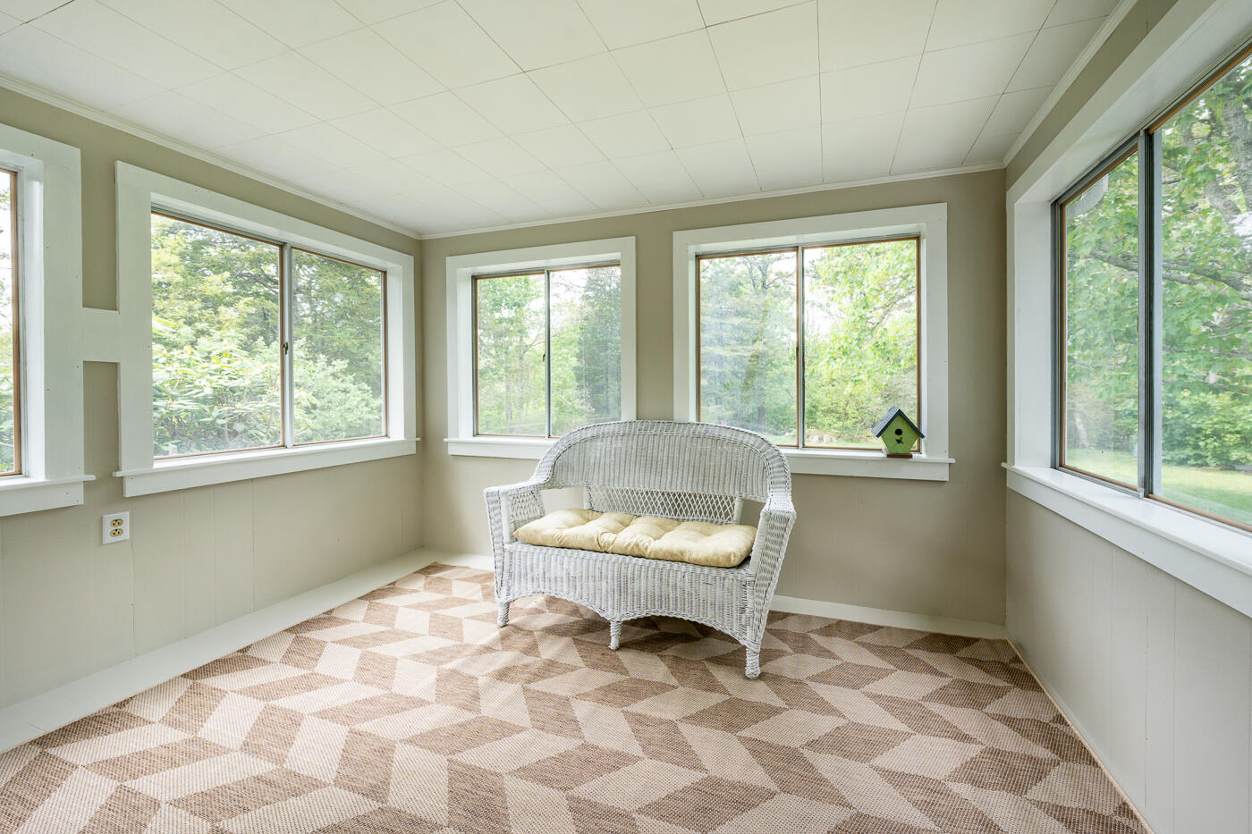 264 Route 28 Harwich, MA 02646 - Photo 23 of 39 a living room with a couch and a window